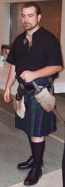 Kyzual in Scottish skirt